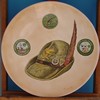 Plate With hat and emblems.